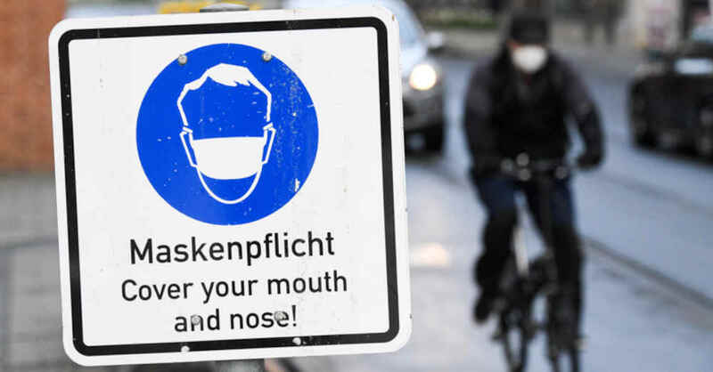 Maskenpflicht, Mund-Nasen-Schutz, Corona, Pandemie, © Tobias Hase - dpa (Symbolbild)
